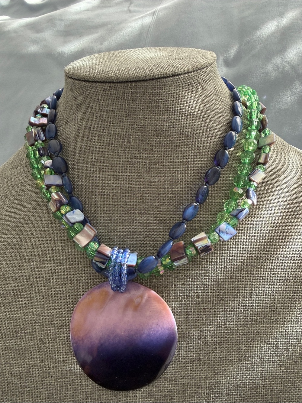 Green and Purple Beaded Necklace with Iridescent Disc Pendant
